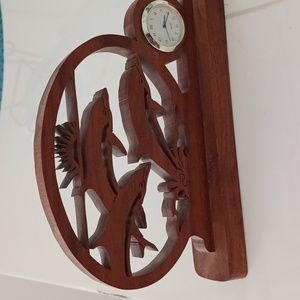 Teak Hand carved dolphin with small clock.